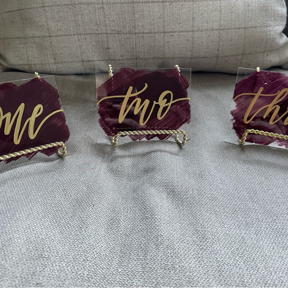 Burgundy and gold table numbers used for my wedding.